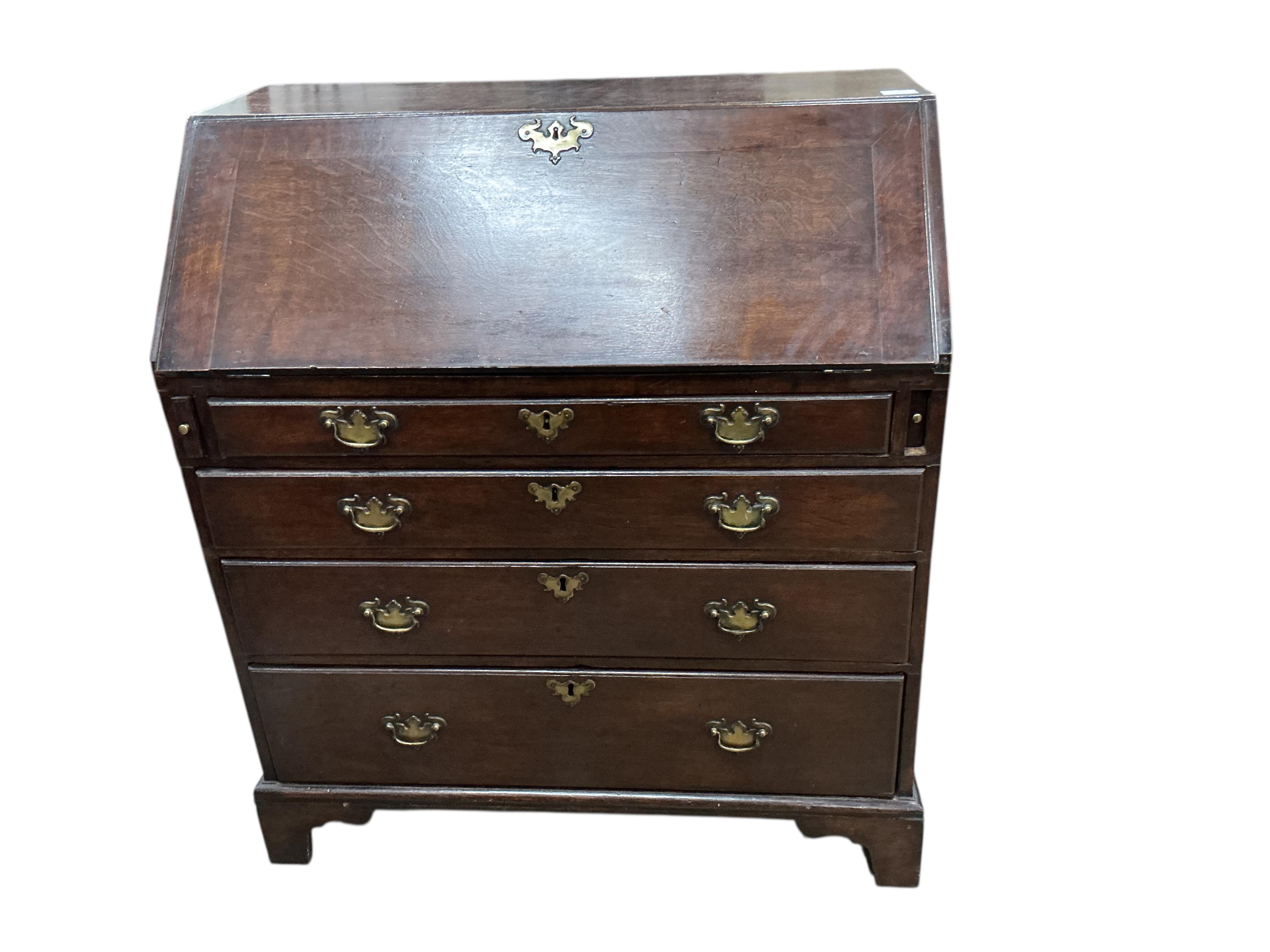 A George III oak bureau, width 91cm, depth 51cm, height 103cm